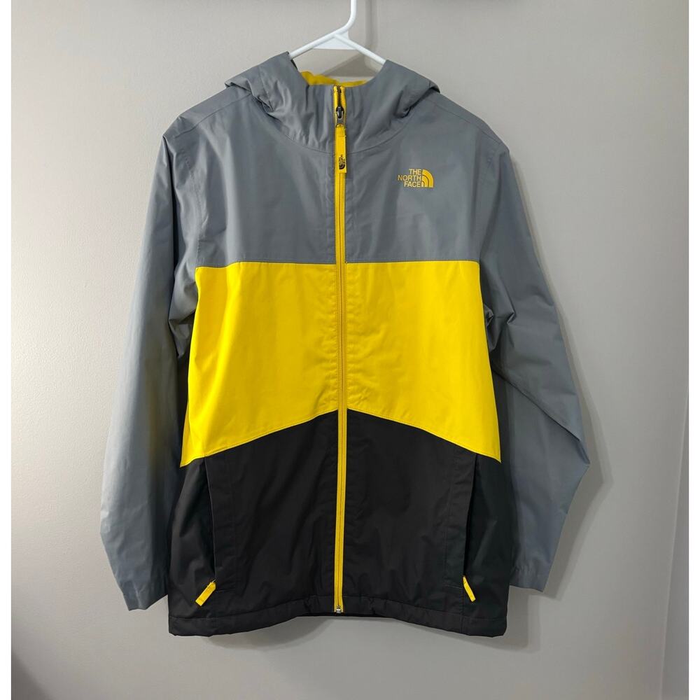 Boys North Face polyester windbreaker jacket with hood. Gray, yellow,black, XL